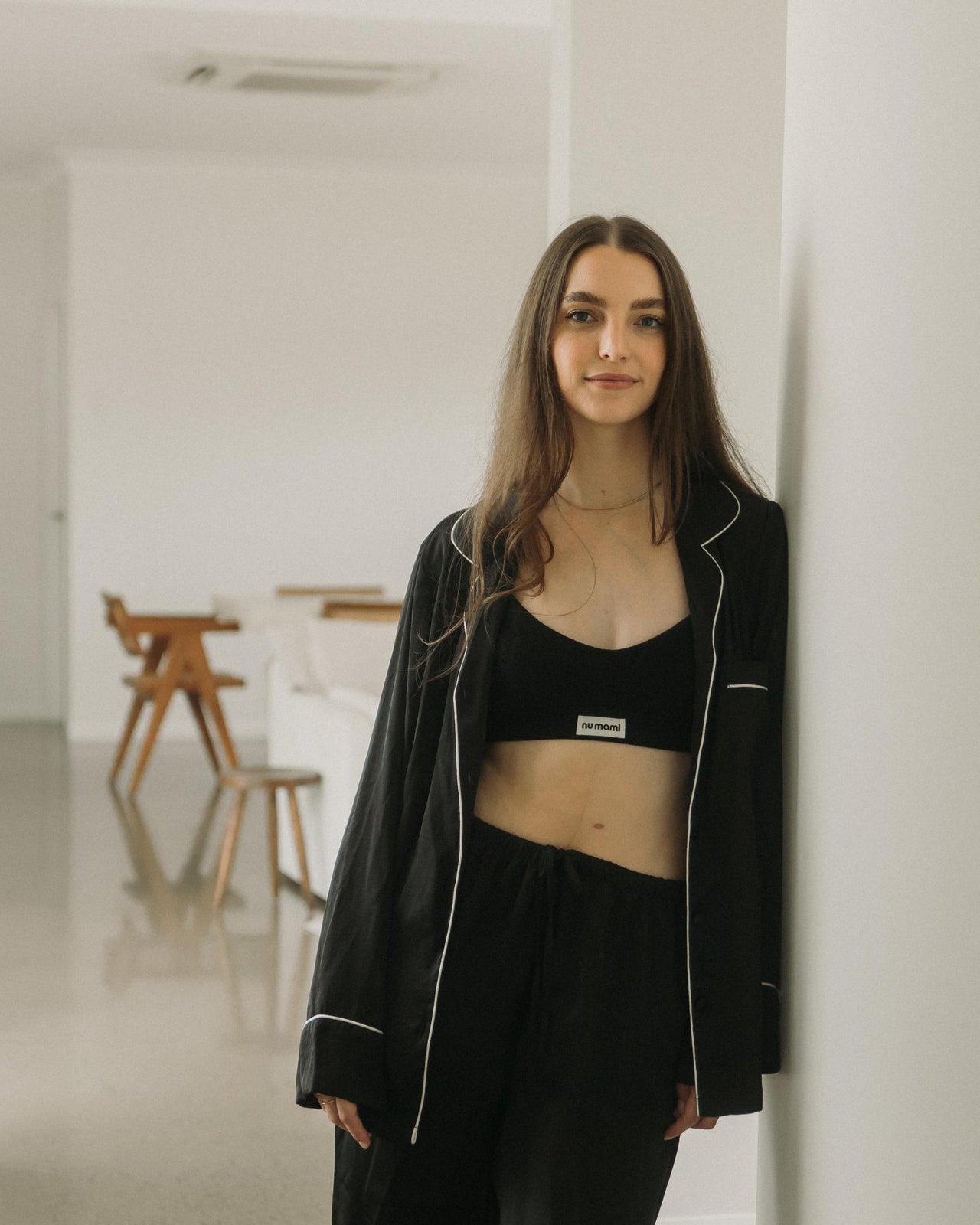 Leakproof maternity bra in black worn by new mum